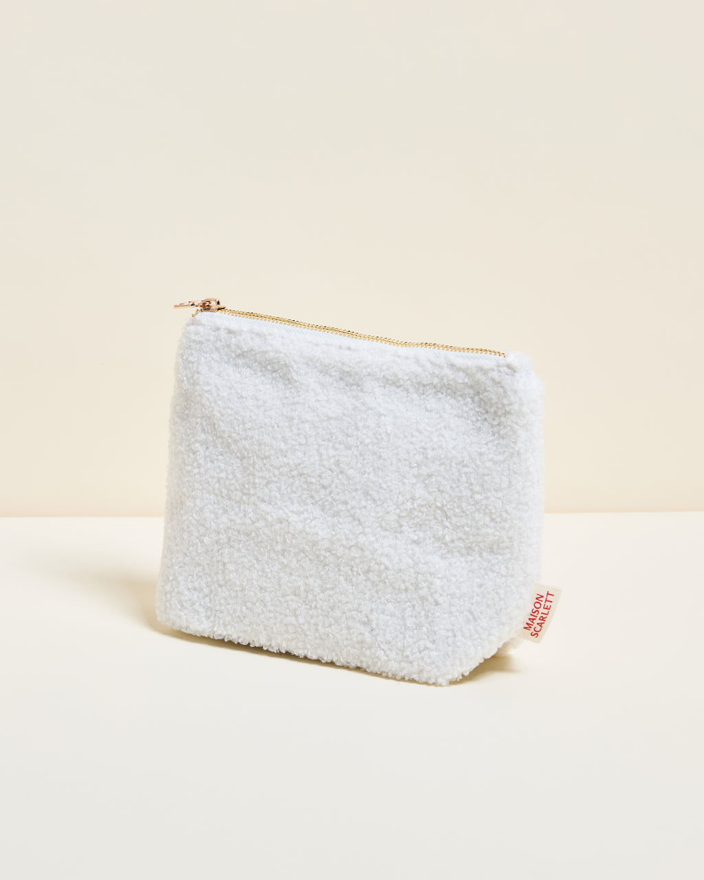 Adélaïde bouclé toiletry bag