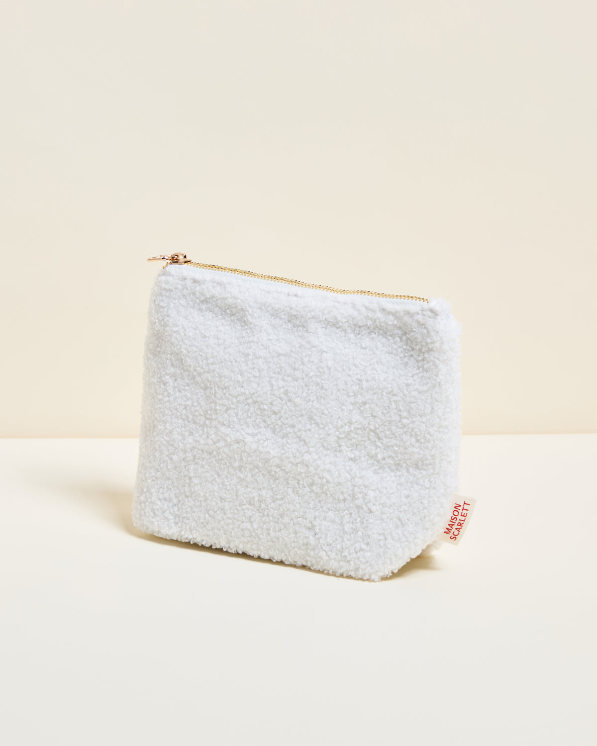 Adélaïde bouclé toiletry bag
